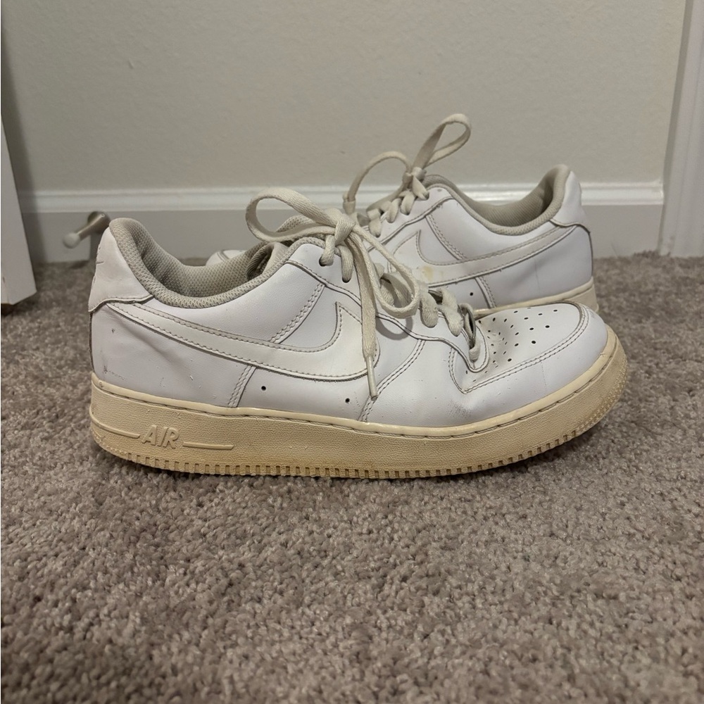 White Nike Air Force 1 sneakers 
Women’s 10/Men’s 8.5